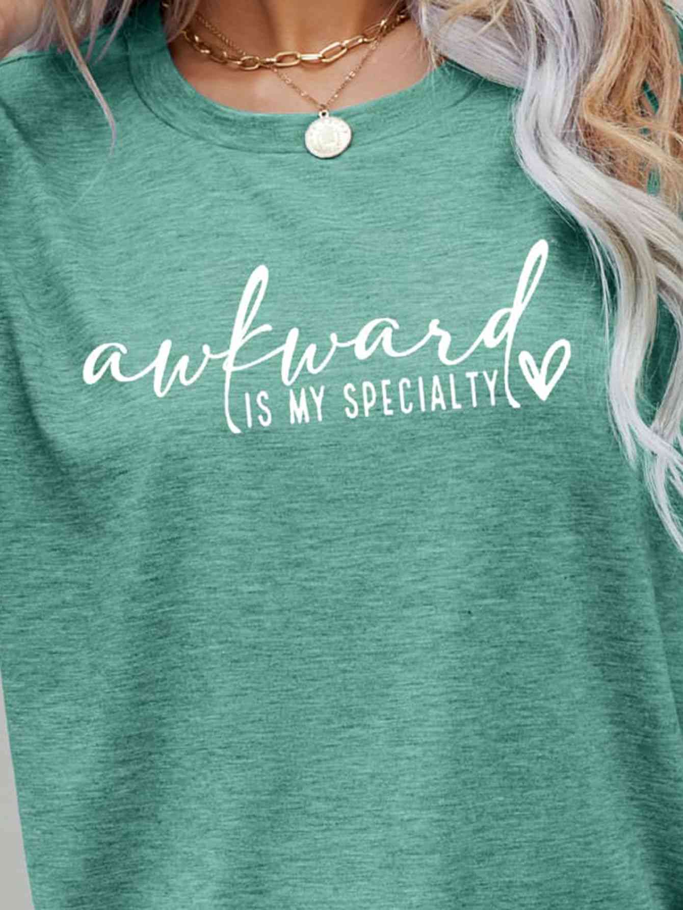 AWKWARD IS MY SPECIALTY Ladies Short Sleeve T-Shirt - Premium Ladies Short Sleeve T-Shirt -  Follower Of Faith Apparel awkward is my specialty, Changeable, funny minimalist, green, grey, humorous tee, ladies Short sleeve, ladies Short Sleeve t shirt, ladies Short Sleeve tee, ladies short sleeve tees, Minimalist apparel, Minimalist t shirts, minimalist tees for ladies, Ship From Overseas Shop our Christian T-Shirts & Apparel