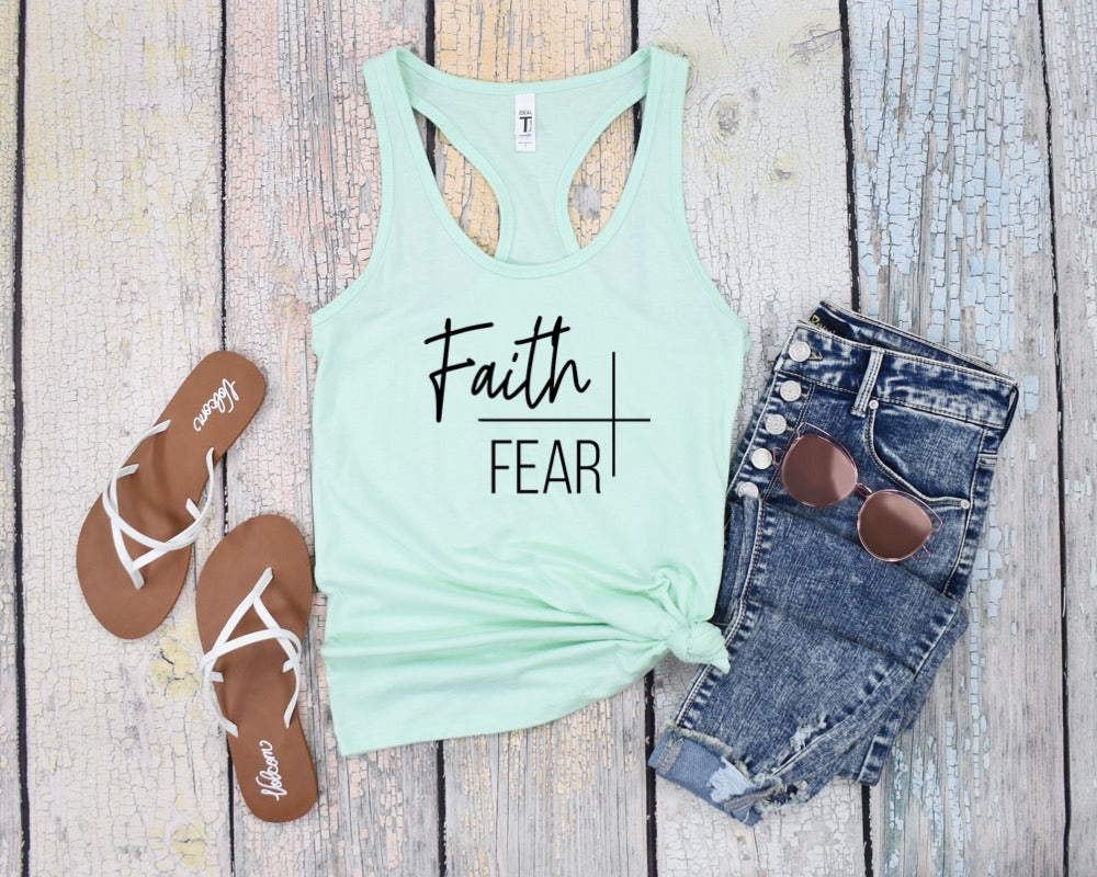 Faith Over Fear Ladies Tank Top - Premium Ladies Tank Top -  Follower Of Faith ApparelChristian tank tops, Christian tank tops for women, faith over fear apparel, faith over fear tank top, faith tank top, ladies Christian tank top, Ladies summer tank tops, ladies tank top, Ladies Tank Tops, Slim fit, Summer Challenge Picks, summer Christian tank top, summer tank tops, Tank Tops, women's Christian tank tops, Women's Clothing, workout tank tops Shop our Christian T-Shirts & Apparel