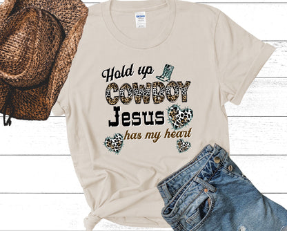 Hold Up Cowboy Jesus Has My Heart Ladies Short Sleeve Tee - Premium T-Shirt -  Follower Of Faith ApparelAnimal print Christian t shirts, Christian apparel and tees, Cotton, Cowgirl and Jesus t shirts, Crew neck, DTG, Hold up Cowboy Jesus has my heart tee, Neck Labels, new, new arrival, Regular fit, T-shirts, Viral Christian t shirt, Women's Clothing Shop our Christian T-Shirts & Apparel