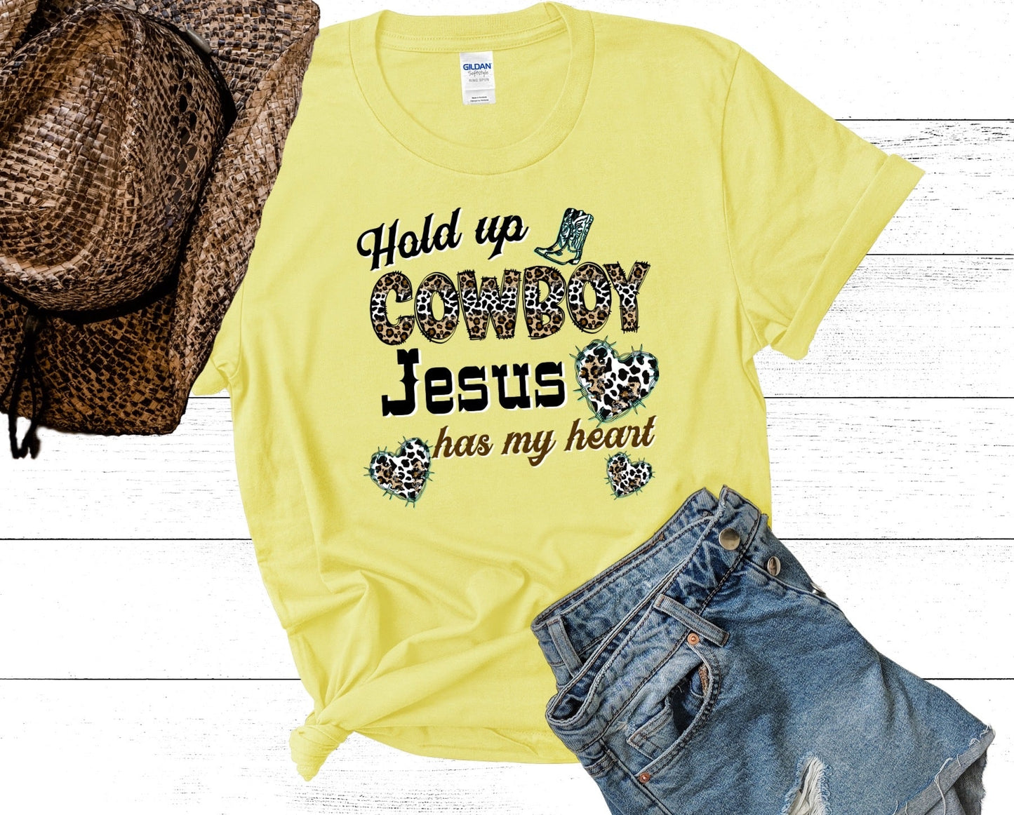 Hold Up Cowboy Jesus Has My Heart Ladies Short Sleeve Tee - Premium T-Shirt -  Follower Of Faith ApparelAnimal print Christian t shirts, Christian apparel and tees, Cotton, Cowgirl and Jesus t shirts, Crew neck, DTG, Hold up Cowboy Jesus has my heart tee, Neck Labels, new, new arrival, Regular fit, T-shirts, Viral Christian t shirt, Women's Clothing Shop our Christian T-Shirts & Apparel