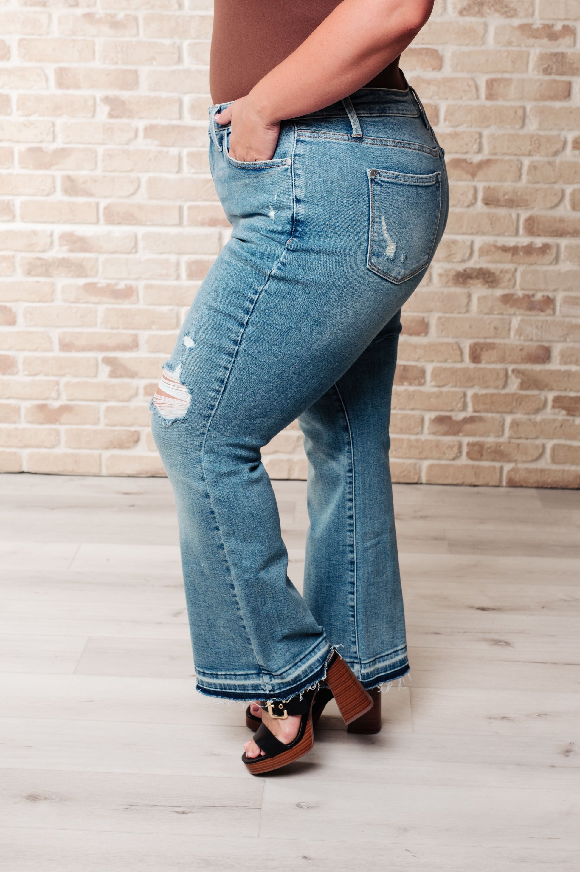 Isla Mid Rise Distressed Released Hem Bootcut Jeans - Premium Denim -  Follower Of Faith Apparel 0/24, 1/25, 11/30, 13/31, 14W, 15/32, 16W, 18W, 20W, 22W, 24W, 3/26, 5/27, 7-18-2024, 7-3-2024, 7/28, 88632, 9/29, Bottoms, Denim, flatrate, JB7-3-2024, JBAvailableNow, Judy Blue Shop our Christian T-Shirts & Apparel