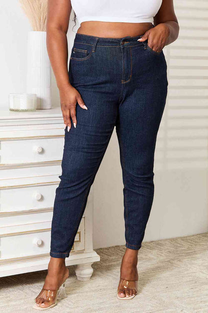 Judy Blue Full Size High Waist Pocket Embroidered Skinny Jeans - Premium Jeans -  Follower Of Faith Apparel 2 day delivery, Black Friday, dark denim jeans, denim jeans, high rise jeans, high waist, high waist jeans, high waisted jeans, jeans, Judy Blue, Judy blue jeans, Ladies blue Jeans, Long Length Jeans, Ship from USA, skinny jeans Shop our Christian T-Shirts & Apparel