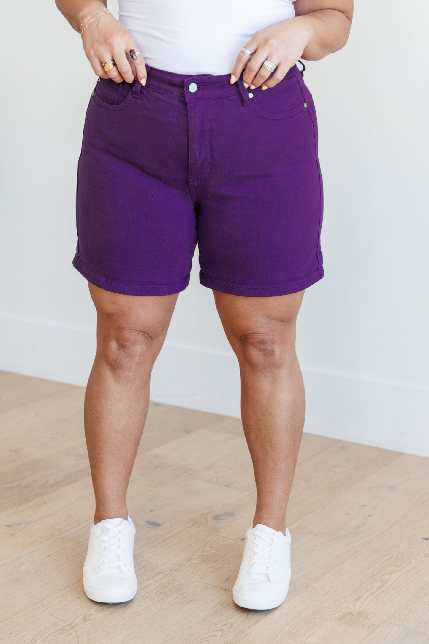 Judy Blue Jenna High Rise Control Top Cuffed Shorts in Purple - Premium Ladies shorts -  Follower Of Faith Apparel150268, 1XL, 2-21-2024, 2XL, 3XL, Bottoms, Control top., Denim, flatrate, JB Judy Blue, JB2-21-2024, JBAvailableNow, Judy Blue, Judy blue colorful shorts, Judy blue control top shorts in purple, Judy blue purple shorts, Judy blue shorts, Judy blue tummy control, Large, Medium, new, new arrival, new arrivals, Sale, Small, stretchy, Stretchy shorts, XL Shop our Christian T-Shirts & Apparel