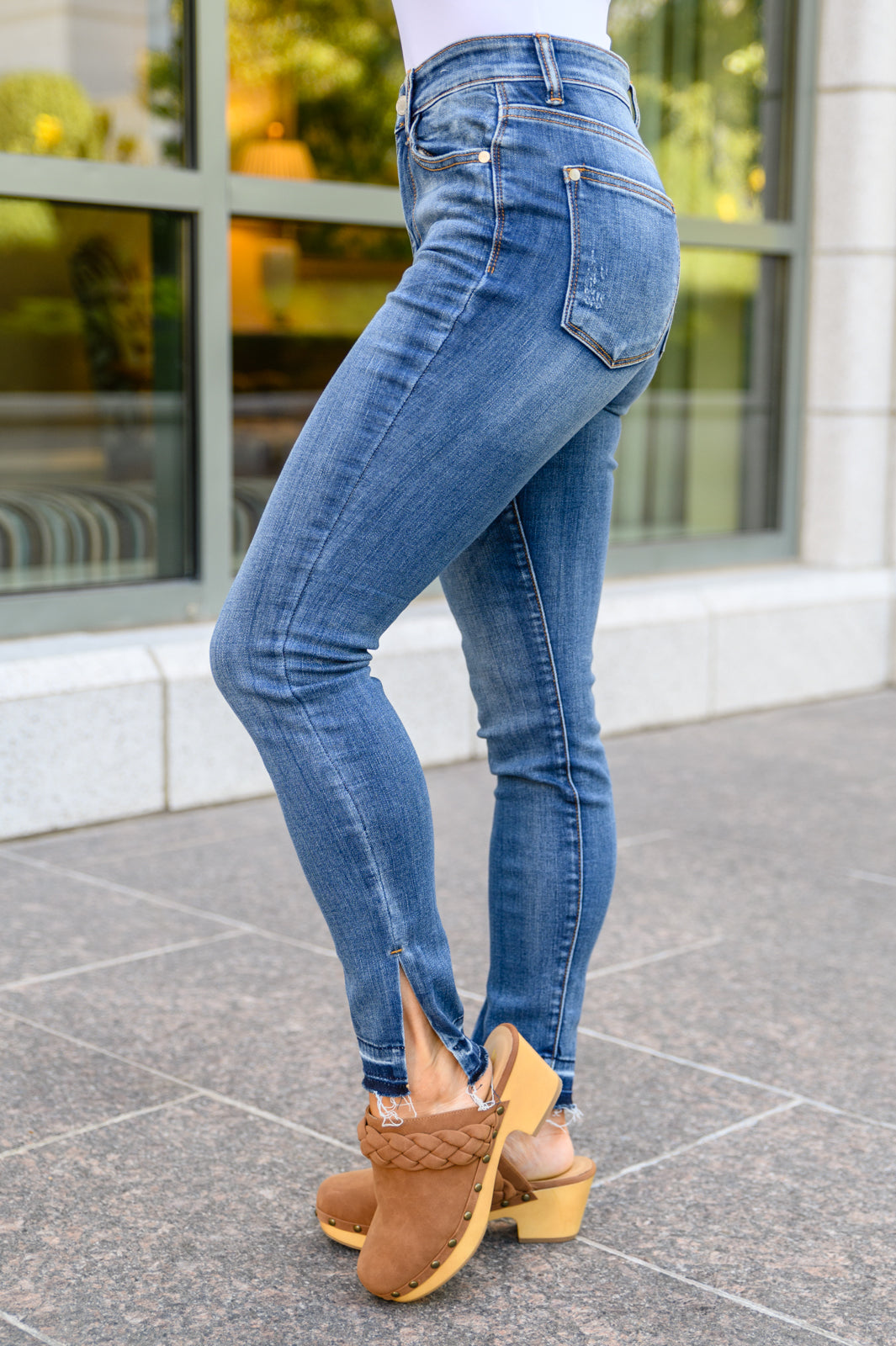 Judy Blue Winona Released Hem Side Slit Skinnies - Premium Womens -  Follower Of Faith Apparel 0/24, 1/25, 10-27-2022, 11/30, 13/31, 14W, 15/32, 16W, 18W, 20W, 22W, 24W, 3/26, 5/27, 7/28, 9/29, ASFWINTER23, Ave Marketplace, Bottoms, D23, Denim, Final Few Friday, flatrate, JBAvailableNow, Judy Blue, winter23 Shop our Christian T-Shirts & Apparel