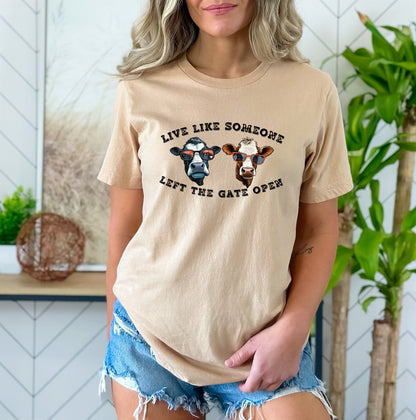 Live Like Someone Left The Gate Open Ladies T-Shirt - Premium Ladies T-Shirt -  Follower Of Faith Apparel Cotton, Country girl t shirt, Cow t shirt, Cowgirl tee, Crew neck, Live like someone left the gate open t shirt, New arrival, Regular fit, Sale, T-shirts, TikTok, Women's Clothing, Womens t shirts, Women’s farmer tee Shop our Christian T-Shirts & Apparel