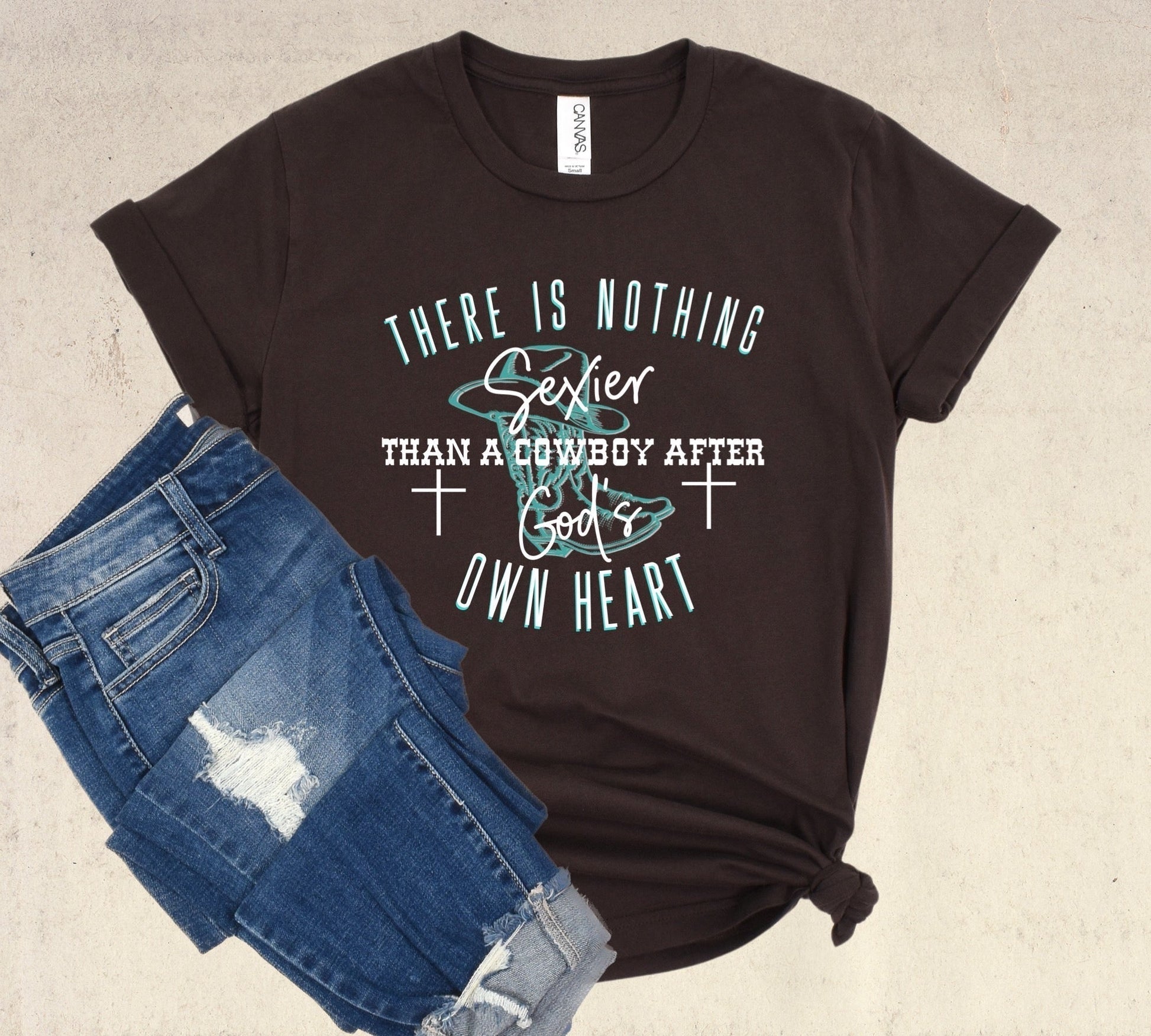 Nothing Sexier Than A Cowboy After God’s Own Heart Ladies T-Shirt - Premium Ladies T-Shirt -  Follower Of Faith ApparelChristian cowgirl t shirts, Cotton, Cowboy after gods own heart t shirt, Cowgirl tees, Crew neck, DTG, Ladies short sleeve, Neck Labels, New, Regular fit, Sexy cowboy, T-shirts, There is nothing sexier than a Cowboy after God’s own heart, Unisex, Women's Clothing Shop our Christian T-Shirts & Apparel