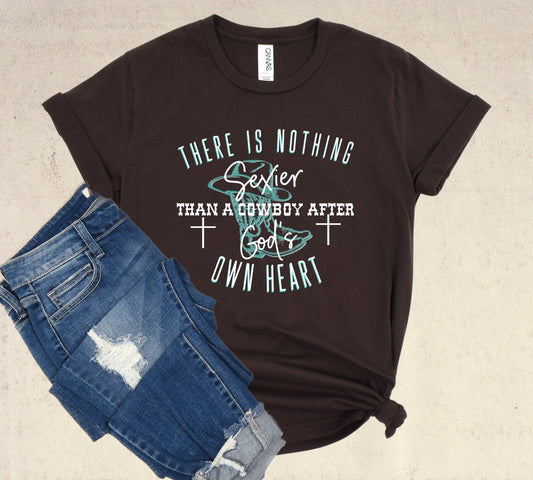 Nothing Sexier Than A Cowboy After God’s Own Heart Ladies T-Shirt - Premium Ladies T-Shirt -  Follower Of Faith ApparelChristian cowgirl t shirts, Cotton, Cowboy after gods own heart t shirt, Cowgirl tees, Crew neck, DTG, Ladies short sleeve, Neck Labels, New, Regular fit, Sexy cowboy, T-shirts, There is nothing sexier than a Cowboy after God’s own heart, Unisex, Women's Clothing Shop our Christian T-Shirts & Apparel