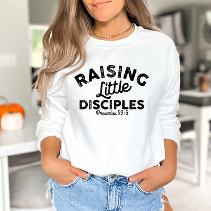 Raising Little Disciples Ladies Sweatshirt - Premium Ladies Sweatshirt -  Follower Of Faith Apparel Christian mom sweatshirts, Crew neck, DTG, Gifts for moms, Jesus shirts, Ladies sweatshirt, Mama apparel, Mom clothing, Raising little disciples, Regular fit, Seasonal Picks, Sweatshirts, Sweatshirts for moms, Unisex, Women's Clothing, Women’s apparel, Women’s Christian apparel Shop our Christian T-Shirts & Apparel