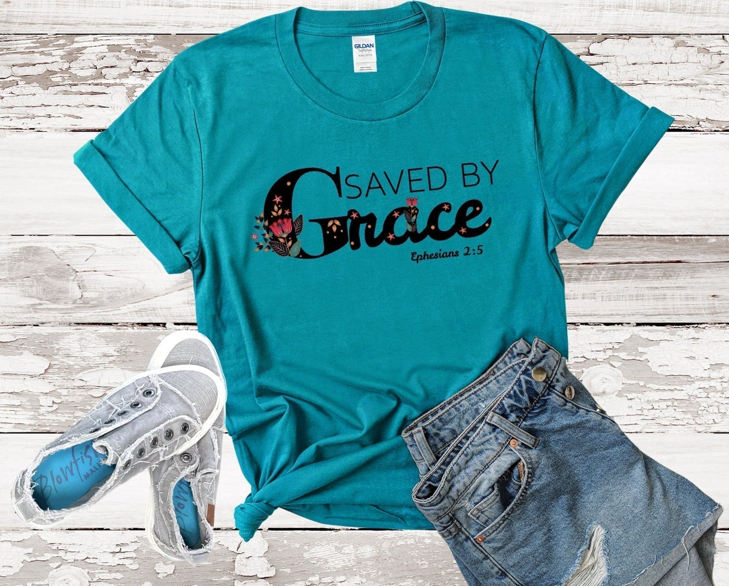 Saved By Grace Ladies Short Sleeve Tee - Premium T-Shirt -  Follower Of Faith ApparelApparel, Christian t shirts for ladies, Cotton, Crew neck, DTG, Faith, Faith apparel, Faith t shirts for ladies, Ladies clothing, Ladies Faith t shirts, Ladies short sleeve, Neck Labels, New, Regular fit, Saved by Grace tee, T-shirts, Women's Clothing, Women’s Christian apparel Shop our Christian T-Shirts & Apparel