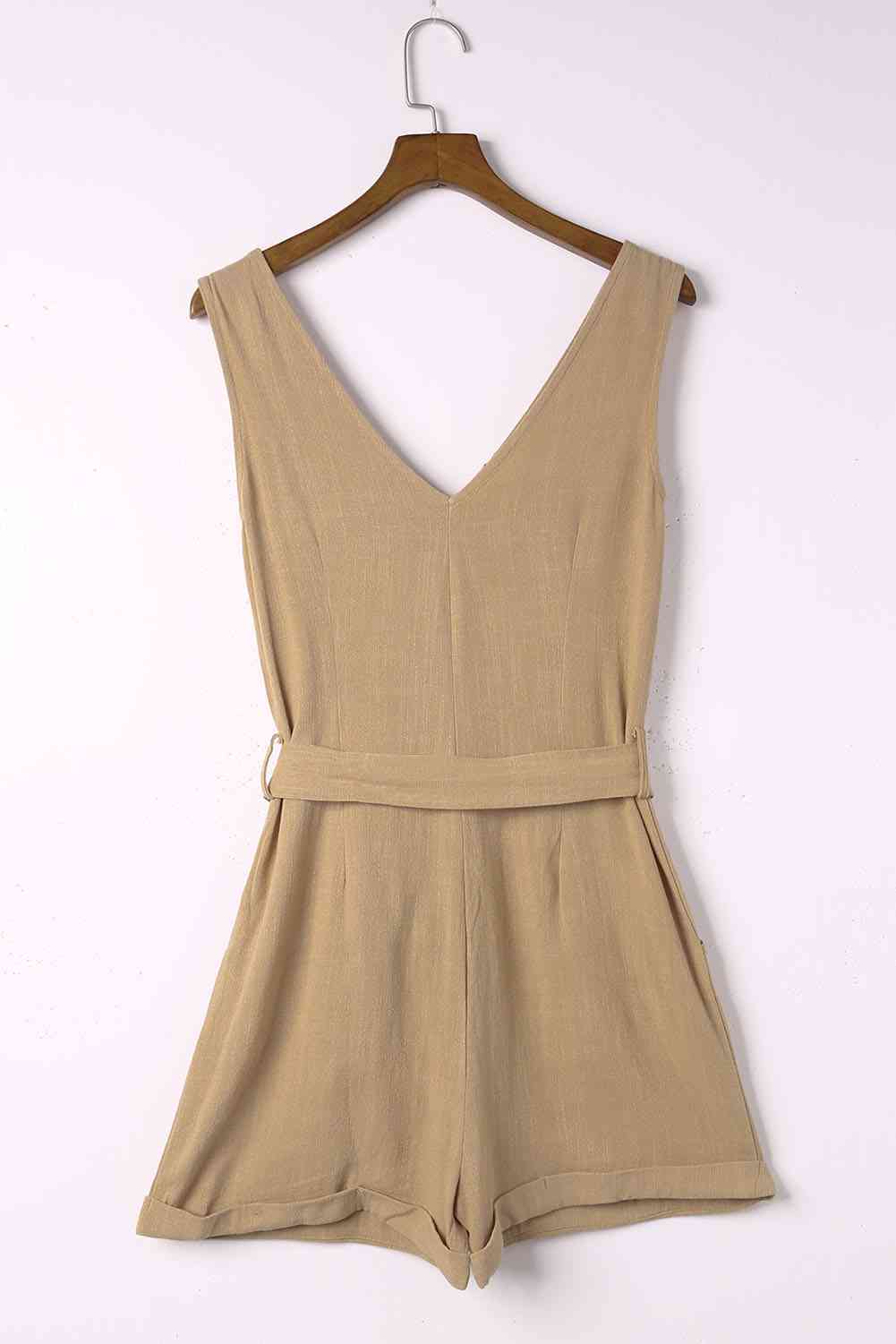 Tie-Waist Buttoned Plunge Sleeveless Romper (several colors) - Premium Ladies Rompers -  Follower Of Faith Apparel chic, Chic clothing, Chic romper, Ladies Romper, romper jumpsuit, Romper with belt, Rompers, Ship From Overseas, Shipping delay February 8 - February 16, SYNZ, V neck romper, Vacation apparel, vacation clothing, Vacation outfit, Vacation outfits, womens apparel, Womens clothing, Womens romper, Women’s romper Shop our Christian T-Shirts & Apparel