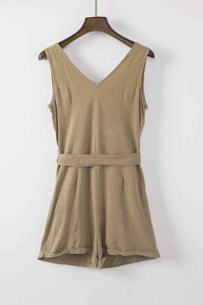 Tie-Waist Buttoned Plunge Sleeveless Romper (several colors) - Premium Ladies Rompers -  Follower Of Faith Apparel chic, Chic clothing, Chic romper, Ladies Romper, romper jumpsuit, Romper with belt, Rompers, Ship From Overseas, Shipping delay February 8 - February 16, SYNZ, V neck romper, Vacation apparel, vacation clothing, Vacation outfit, Vacation outfits, womens apparel, Womens clothing, Womens romper, Women’s romper Shop our Christian T-Shirts & Apparel