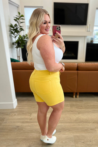 Judy Blue Jenna High Rise Control Top Cuffed Shorts in Yellow - Premium Ladies shorts -  Follower Of Faith Apparel150284, 1XL, 2-21-2024, 2XL, 3XL, Bottoms, Control top, Denim, flatrate, JB Judy Blue, JB2-21-2024, JBAvailableNow, Judy Blue, Judy blue colorful shorts, Judy blue control top shorts in yellow, Judy blue shorts, Judy blue tummy control, Judy blue tummy control shorts, Judy blue yellow shorts, Large, Medium, new, new arrival, new arrivals, Sale, Small, XL Shop our Christian T-Shirts & Apparel