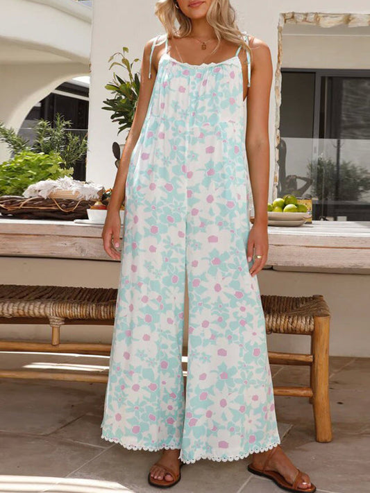 Pastel Floral Wide Leg Jumpsuit with Pockets - Premium Ladies Rompers -  Follower Of Faith Apparel Chic romper, Cozy rompers, Floral Ladies Romper, Ladies Romper, new arrival, new arrivals, romper jumpsuit, Romper pants, Romper pants jumpsuit, Rompers, Sale, Ship From Overseas, Spaghetti Strap Romper, T@D, Vacation rompers, Womens floral jumpsuit romper, Womens floral romper, Women’s romper Shop our Christian T-Shirts & Apparel